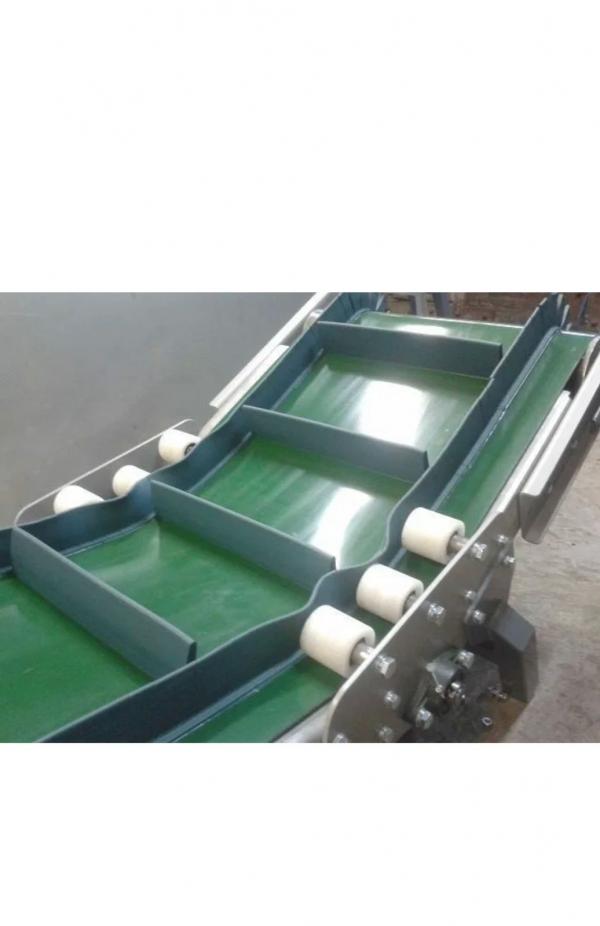 Подъемный транспортет с модульной лентой